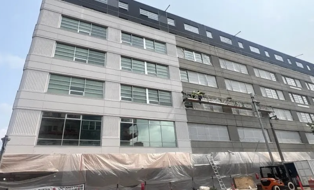 Precision concrete repair work on Milwaukee commercial structure using ICRI-standard surface preparation