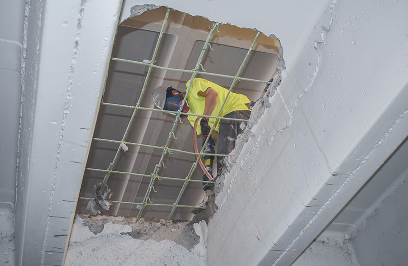 Minneapolis parking structure rehabilitation combining 15,000 square feet of structural concrete replacement with 49,000 square feet of new traffic coating installation