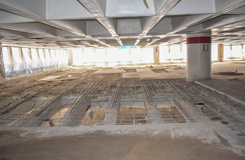 St. Paul parking structure rehabilitation project showing comprehensive concrete repair and traffic coating installation across a multi-level commercial garage