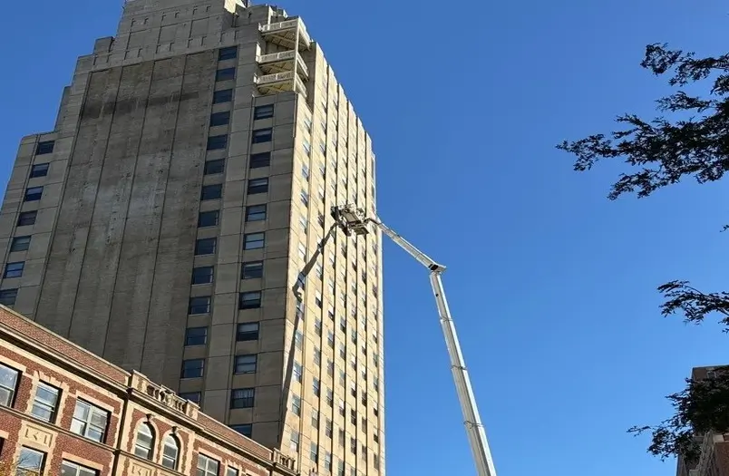 Wisconsin Tower Condominiums in Milwaukee — a 1930s Art Deco landmark restored by RSI across 35,000 square feet using a specialty 250-foot aerial platform