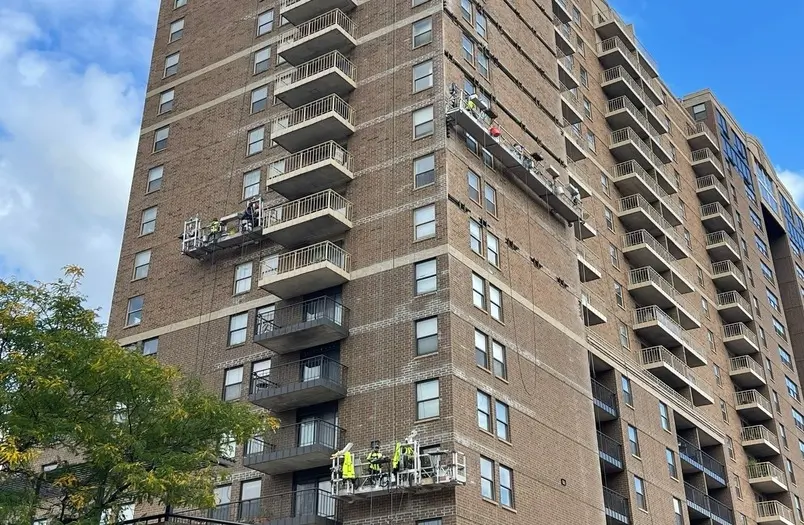 RiverWest Building historic façade restoration in Minneapolis showing extensive sealant replacement at windows and doors