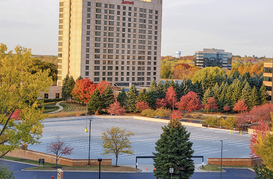 Completed parking ramp restoration showing new traffic coating surface after removal and preparation in Minneapolis