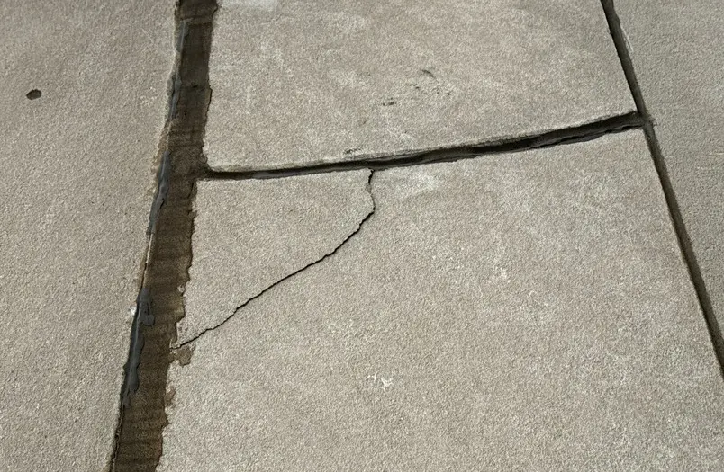 Close-up of concrete repair work on Wisconsin Tower facade