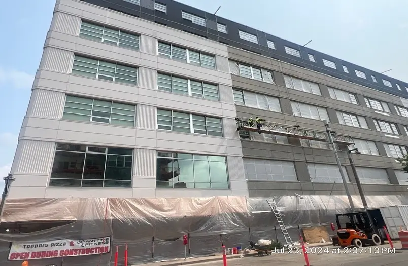 Kenilworth Square Apartments in Milwaukee showing media blasting surface preparation on parking structure concrete