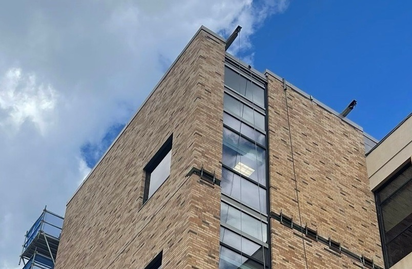 Building envelope restoration at Mercy Heart Hospital demonstrating comprehensive scope