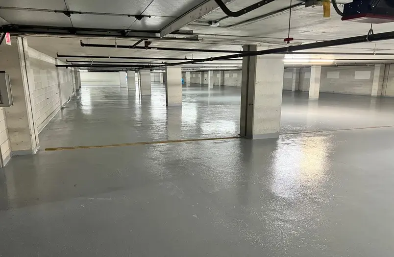 Completed parking garage flooring at RiverWest showing finished restoration from another angle