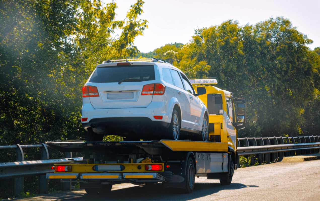 Towing cost factors including vehicle type and distance